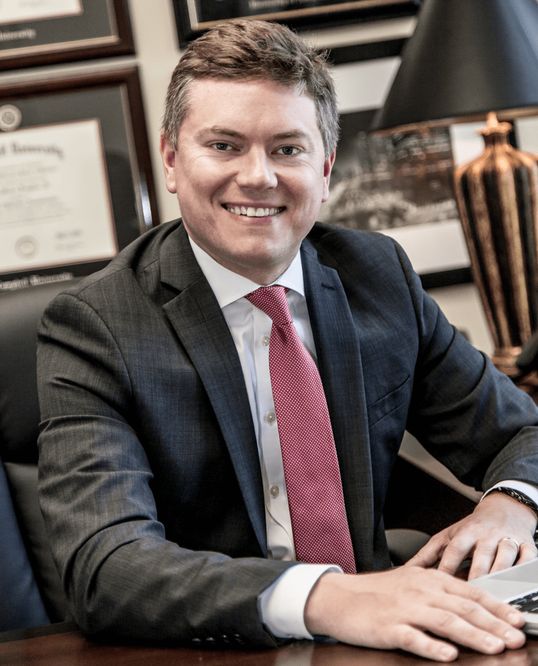 Lucien M. Roughton at his desk